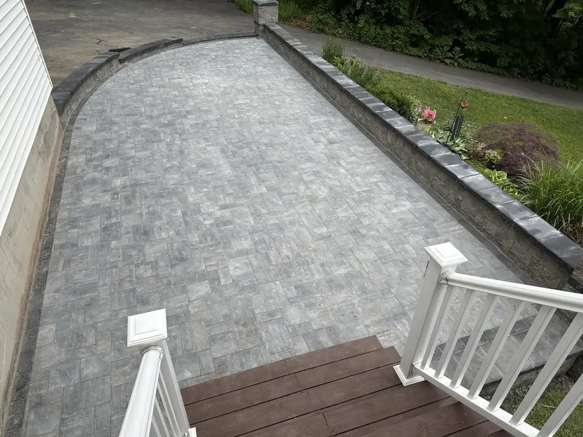 Stone retaining wall on a hillside property in Orange County NY