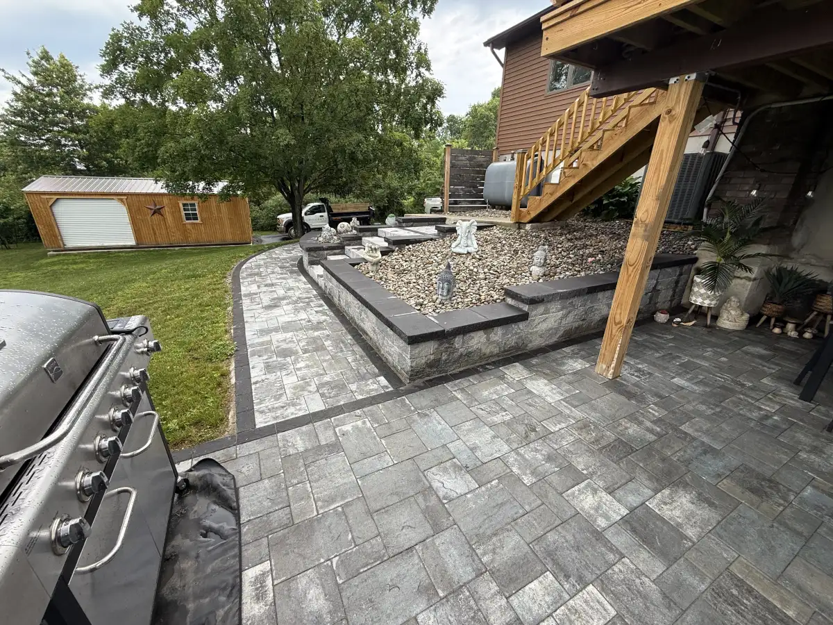 Paver patio, walkway, steps, and low walls by Bernicker and Son Landscaping